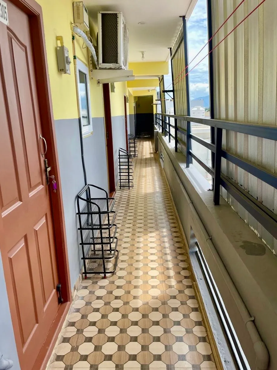 Open-air corridor at Q Residency